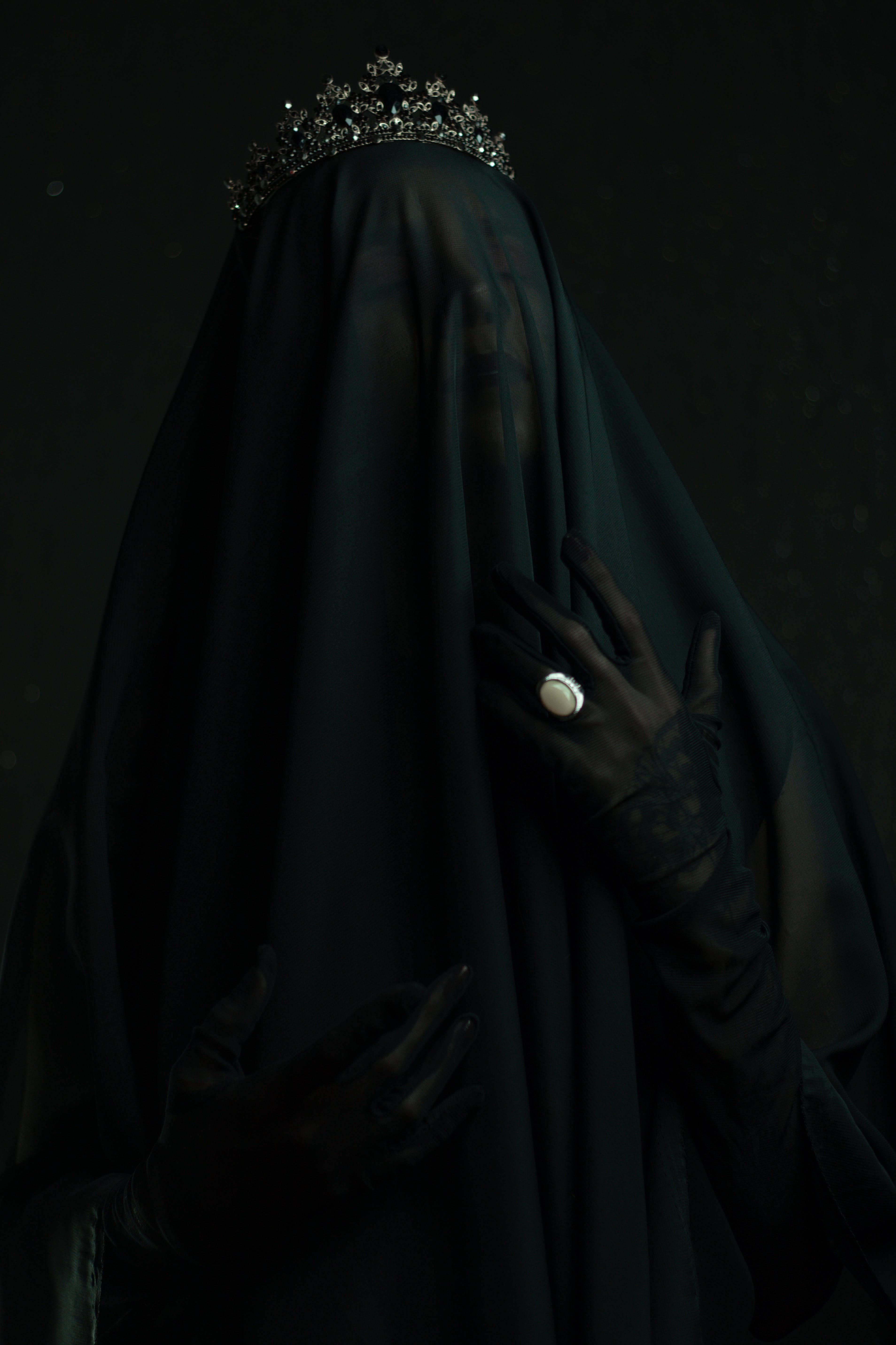 A woman in black veil